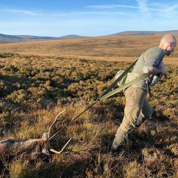 Green, Tough, and lightweight deer drag strap for easy carcess retrieval