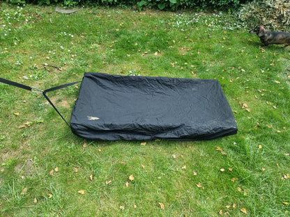 Lightweight cover for an animal transit box sled, keeping carcess protected and out of sight