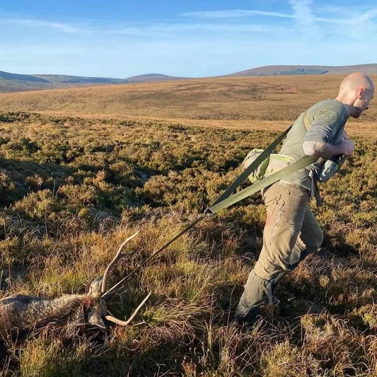 Green, Tough, and lightweight deer drag strap for easy carcess retrieval