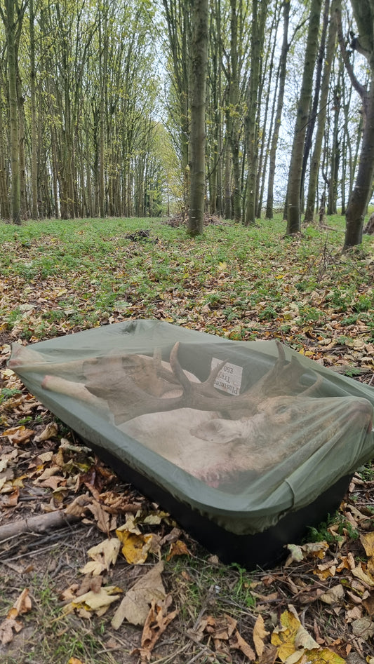 Fly Mesh Carcass Cover, a strong, breathable mesh cover designed to fit standard plasterers trays (4ft x 2ft) to protect a deer carcass from flies and dirt while allowing airflow