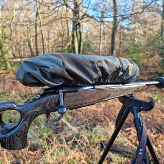 Lightweight, water-resistant slip-on rifle scope cover, designed for quick protection during light rain showers, with a loose fit to accommodate IR or scope accessories